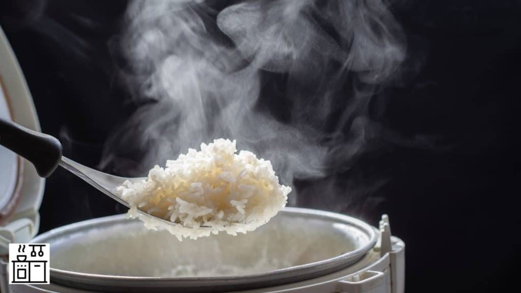 Image of rice being taken out from rice cooker