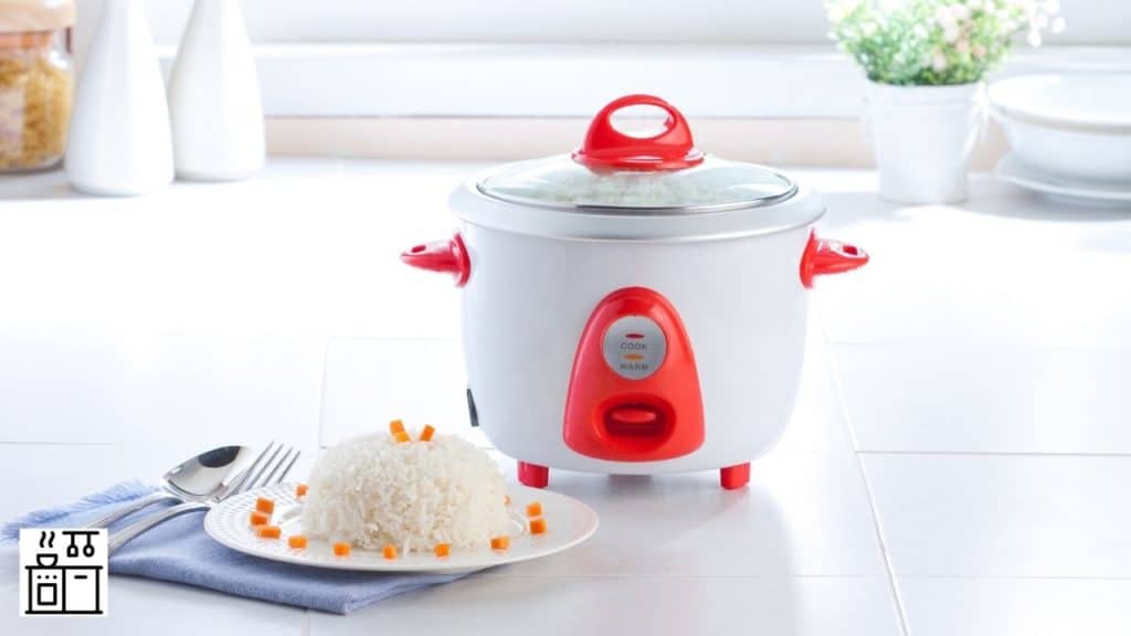 Image of an electric rice cooker kept in kitchen