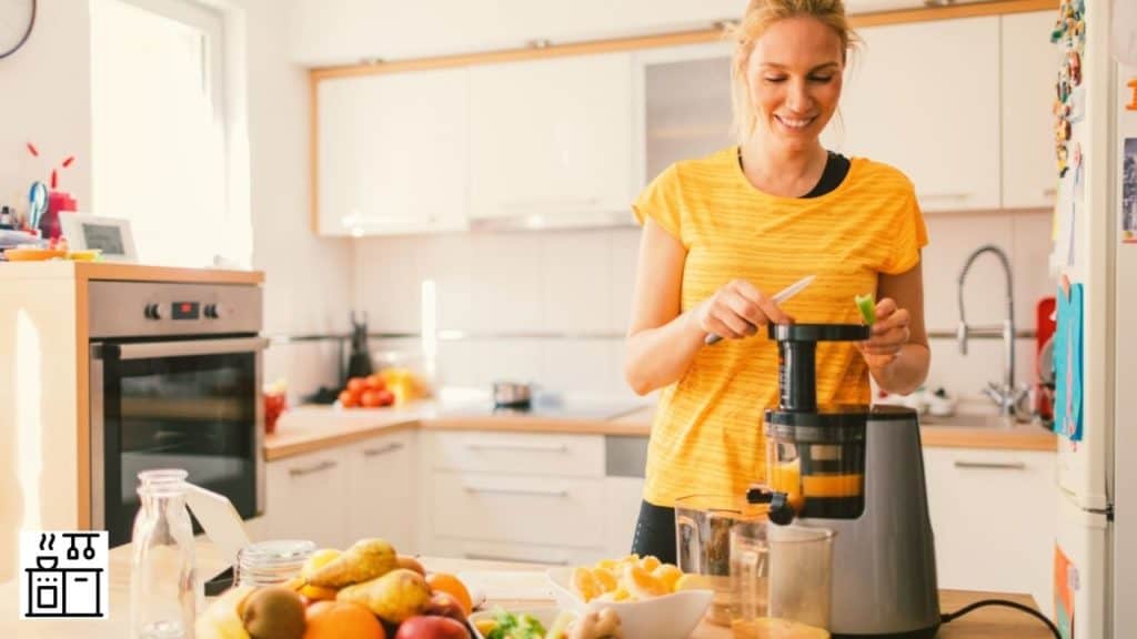 Image of a woman operating a juicer
