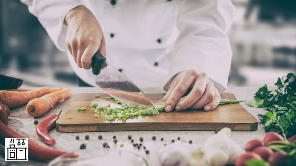 Image of a professional chef using a knife