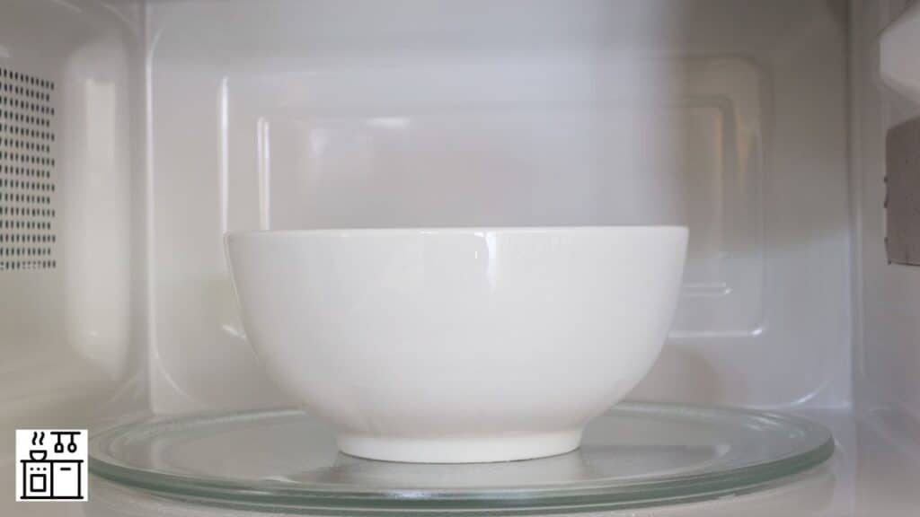 Image of a ceramic bowl in an oven