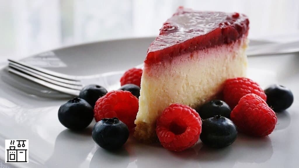 Image of a cheesecake about to be refrigerated