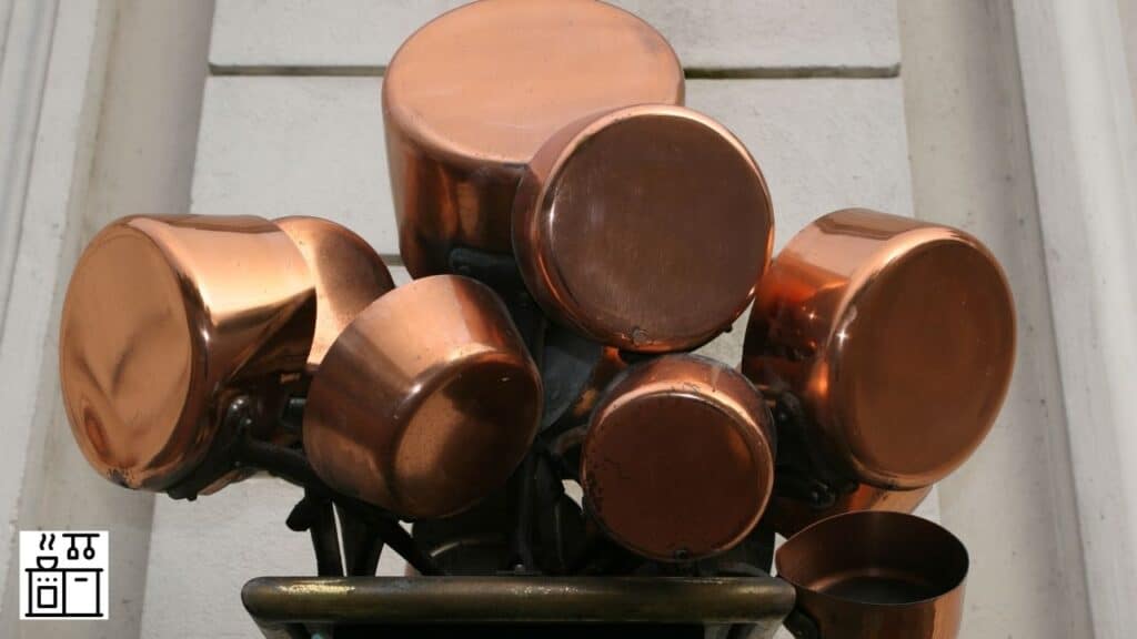 Copper saucepans in a kitchen