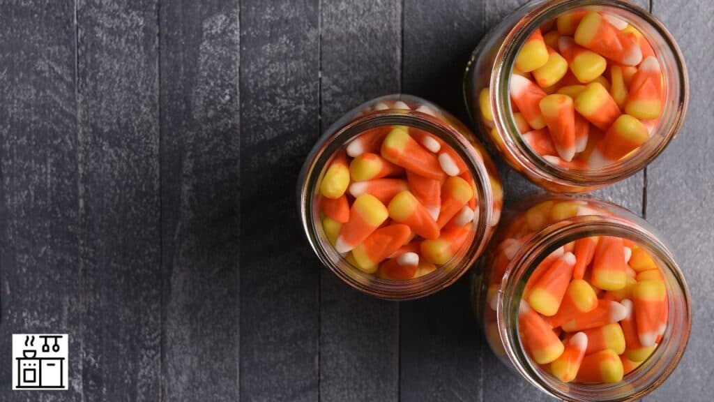 Sweet candy corn in jars