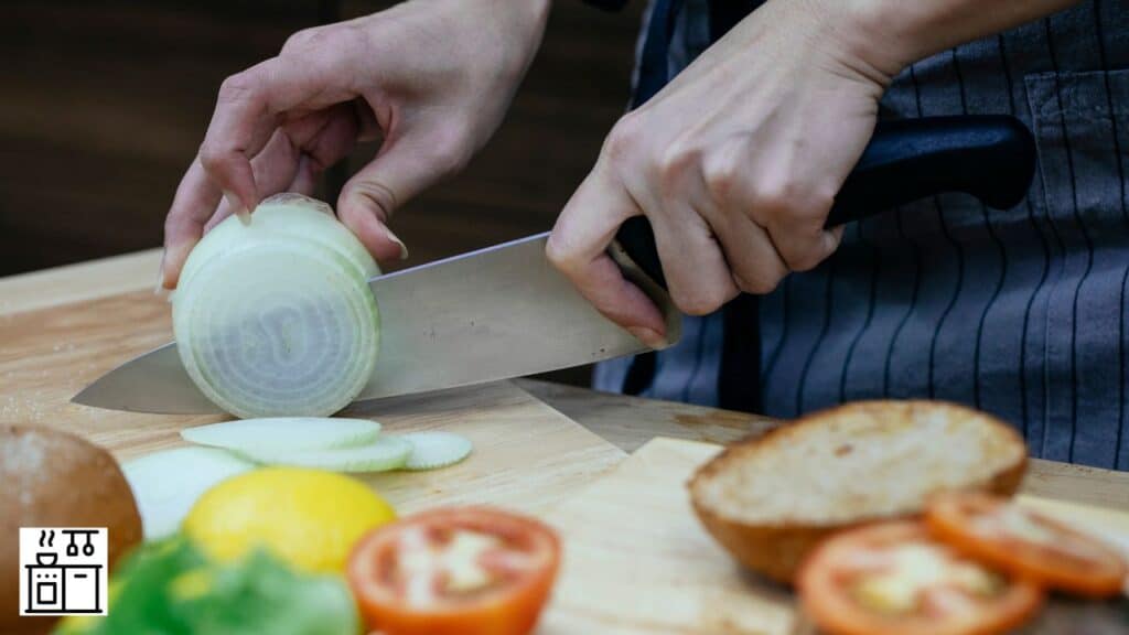 Woman cutting onion