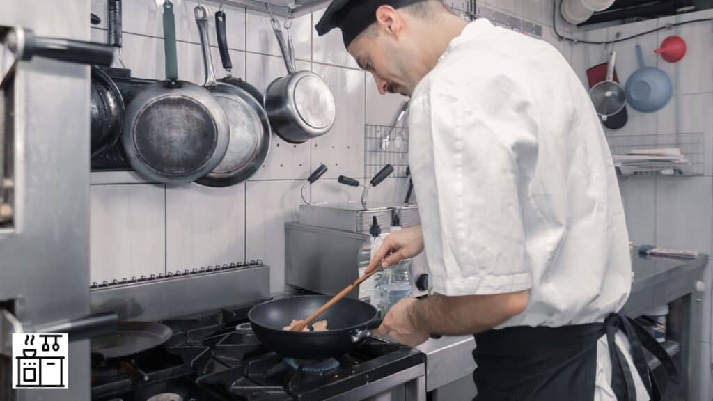 Chef using a pan