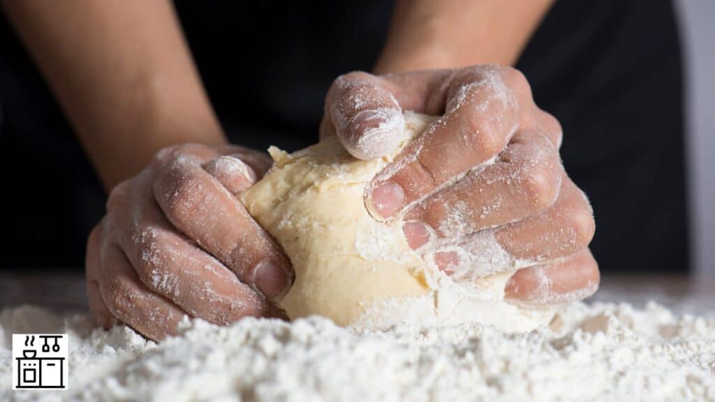 Woman kneading Pillsbury dough