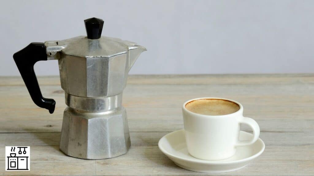 Percolator with coffee cup