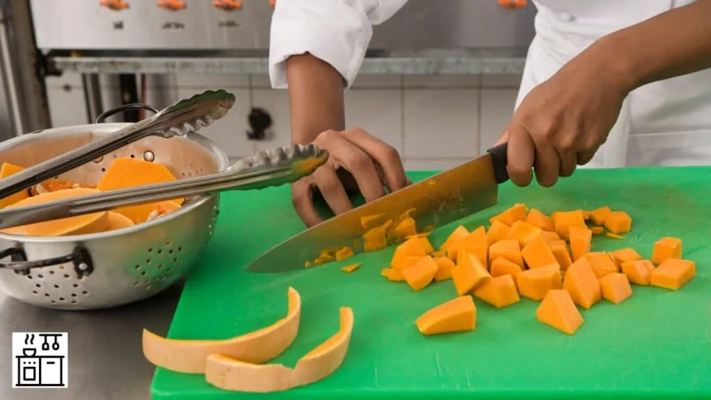 Chef cutting squash