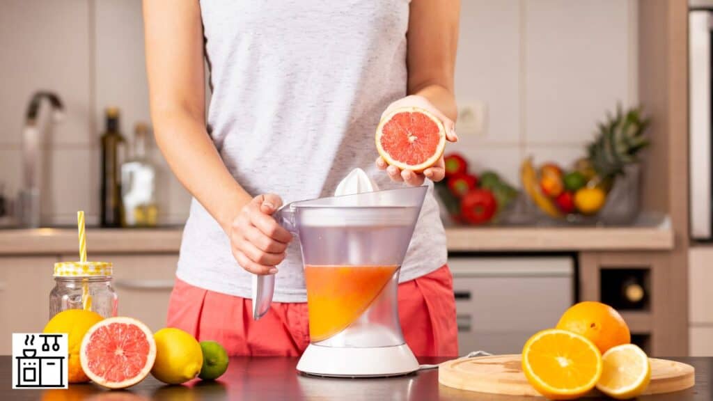 Citrus juicer in use