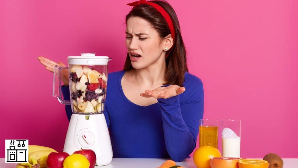 Woman trying to use a food processor
