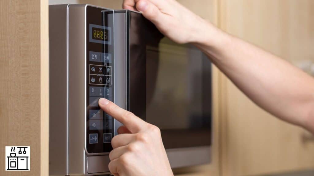 Woman using microwave oven